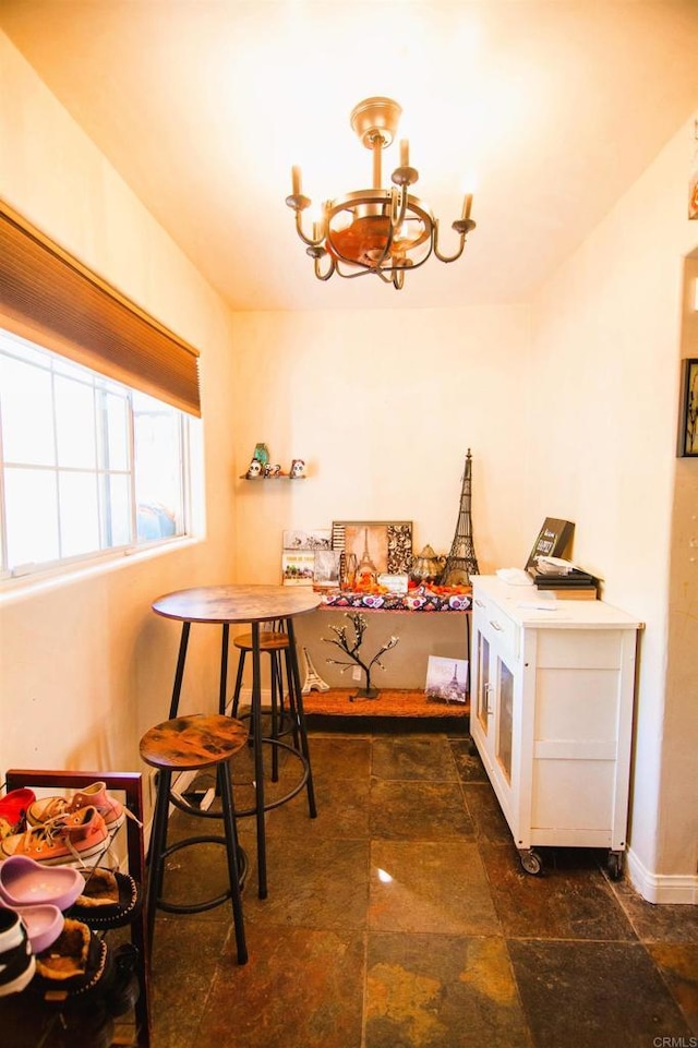 18326 Brightman Ave, Lake Elsinore, CA 92530 - dining room with baseboards and a chandelier