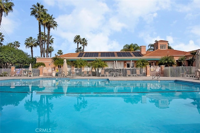 pool featuring fence