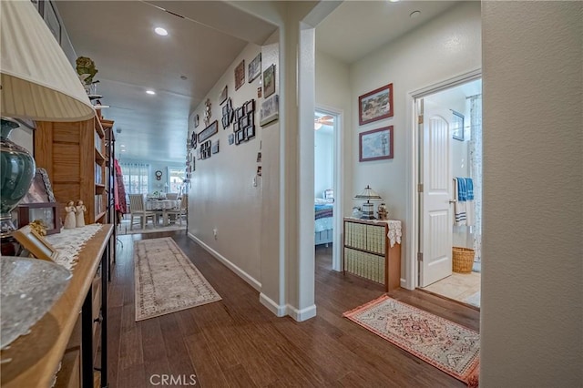 718 Marybelle Dr, Merced, CA 95348 - corridor featuring dark wood finished floors, baseboards, and recessed lighting