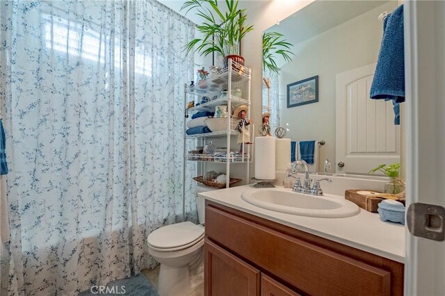 718 Marybelle Dr, Merced, CA 95348 - bathroom with toilet and vanity