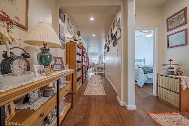 718 Marybelle Dr, Merced, CA 95348 - hallway with recessed lighting, wood finished floors, and baseboards