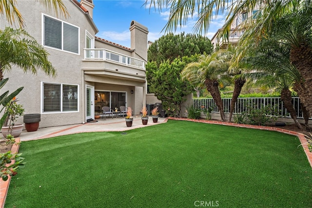 20 Marseille, Laguna Niguel, CA 92677 - view of yard featuring a patio, a fenced backyard, and a balcony