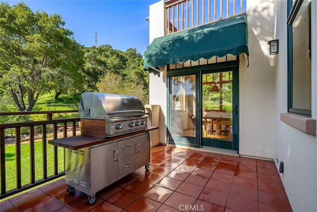 view of patio with a grill