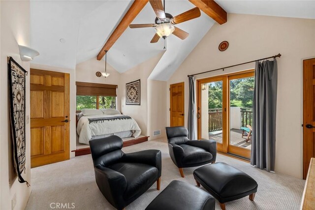 carpeted bedroom featuring access to outside, ceiling fan, vaulted ceiling with beams, and multiple windows