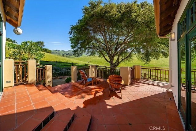 view of patio with a mountain view