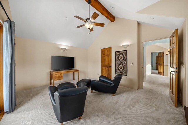 living room featuring light colored carpet, a ceiling fan, beam ceiling, and high vaulted ceiling