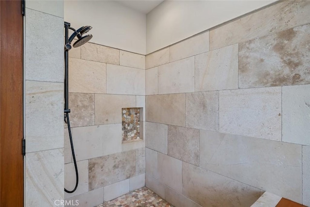 details featuring a tile shower
