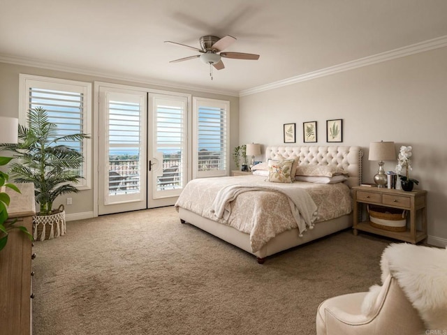 7076 Heron Cir, Carlsbad, CA 92011 - bedroom featuring access to exterior, ornamental molding, multiple windows, carpet floors, and baseboards