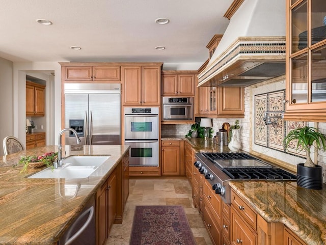 7076 Heron Cir, Carlsbad, CA 92011 - kitchen featuring stainless steel appliances, custom range hood, a sink, brown cabinetry, and recessed lighting