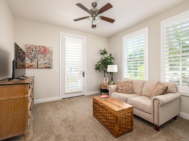 7076 Heron Cir, Carlsbad, CA 92011 - carpeted living room featuring ceiling fan and baseboards