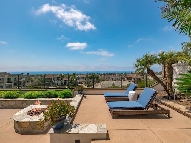 7076 Heron Cir, Carlsbad, CA 92011 - view of patio / terrace with a fire pit and a residential view