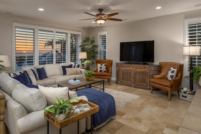 7076 Heron Cir, Carlsbad, CA 92011 - living room with ceiling fan, recessed lighting, and light stone finish floors