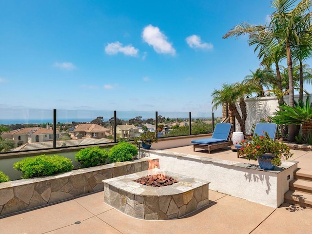 7076 Heron Cir, Carlsbad, CA 92011 - view of patio / terrace with a fire pit and a residential view