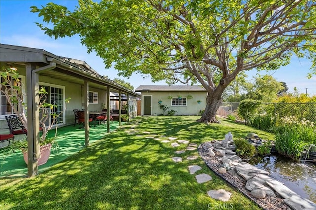 view of yard featuring a fenced backyard