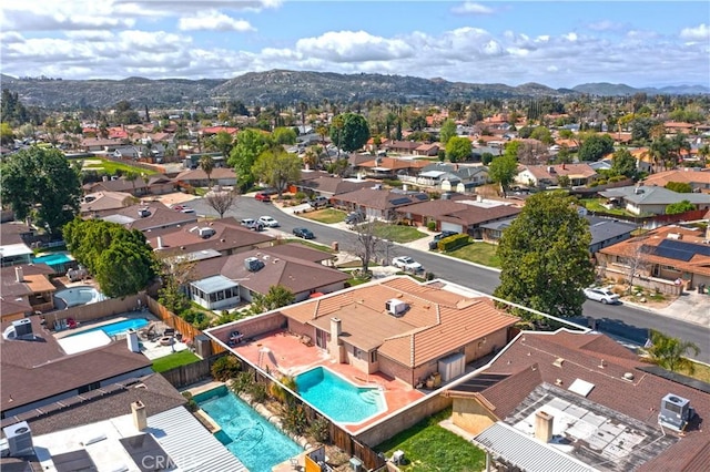 bird's eye view featuring a residential view and a mountain view
