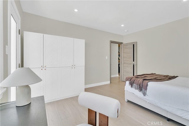 13301332 N Lincoln St, Burbank, CA 91506 - bedroom with baseboards, light wood-style floors, and recessed lighting