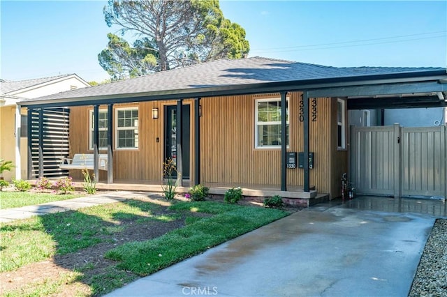 13301332 N Lincoln St, Burbank, CA 91506 - view of front of property featuring a shingled roof and covered porch