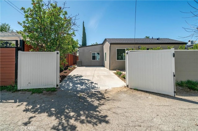 13301332 N Lincoln St, Burbank, CA 91506 - view of front of house with fence, a gate, and stucco siding