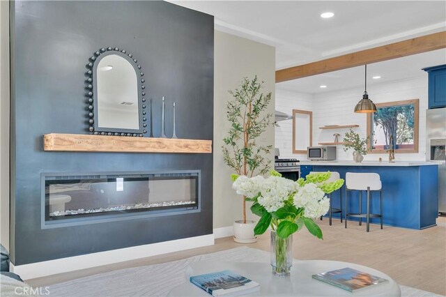13301332 N Lincoln St, Burbank, CA 91506 - interior space with baseboards, a glass covered fireplace, wood finished floors, and recessed lighting