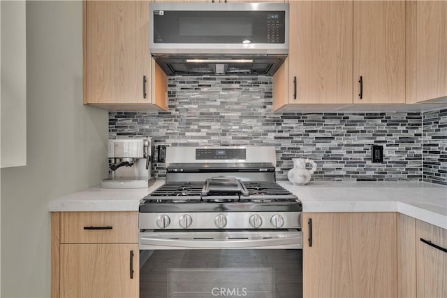 13301332 N Lincoln St, Burbank, CA 91506 - kitchen featuring light brown cabinets, light countertops, appliances with stainless steel finishes, and tasteful backsplash