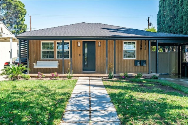 13301332 N Lincoln St, Burbank, CA 91506 - view of front of house with a porch, a shingled roof, and a front yard