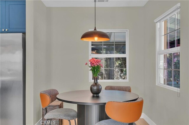 13301332 N Lincoln St, Burbank, CA 91506 - dining space featuring visible vents and baseboards