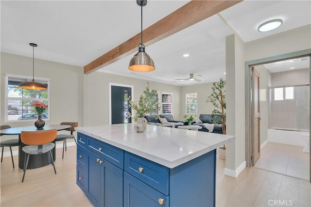 13301332 N Lincoln St, Burbank, CA 91506 - kitchen with beamed ceiling, plenty of natural light, light wood-type flooring, and blue cabinets