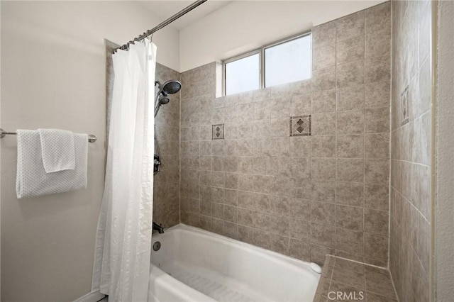 bathroom with shower / tub combo