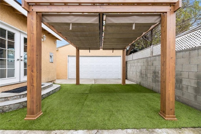 exterior space with fence, french doors, and an outbuilding