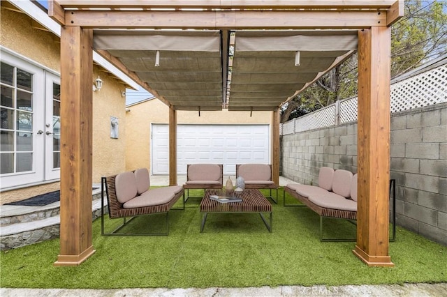 view of patio / terrace with outdoor lounge area, fence, and french doors