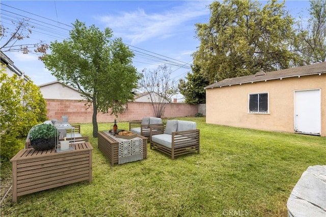 view of yard with outdoor lounge area and fence private yard