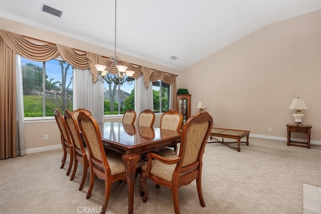 dining space with light carpet, baseboards, an inviting chandelier, visible vents, and lofted ceiling