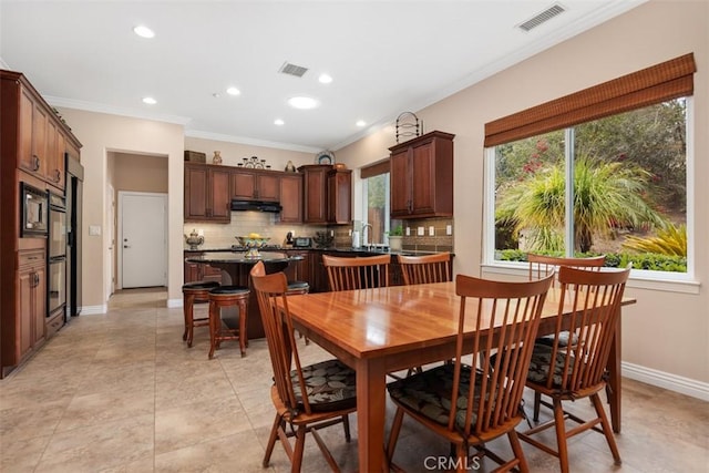 dining space with recessed lighting, visible vents, baseboards, and ornamental molding