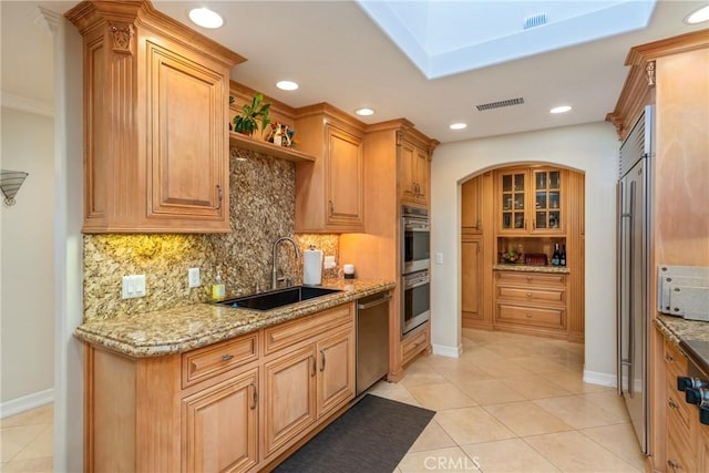 130 Mariposa Way, Brea, CA 92823 - kitchen featuring visible vents, decorative backsplash, stainless steel appliances, and a sink