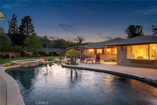 130 Mariposa Way, Brea, CA 92823 - pool at dusk with an outdoor pool, a patio, and an in ground hot tub