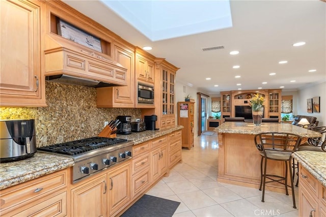 130 Mariposa Way, Brea, CA 92823 - kitchen with decorative backsplash, appliances with stainless steel finishes, and visible vents