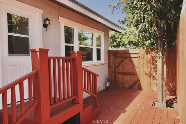 3222 E 10th St, Long Beach, CA 90804 - wooden terrace featuring a gate