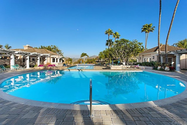 18614 Caminito Cantilena Unit 324, San Diego, CA 92128 - community pool featuring a patio area and a hot tub