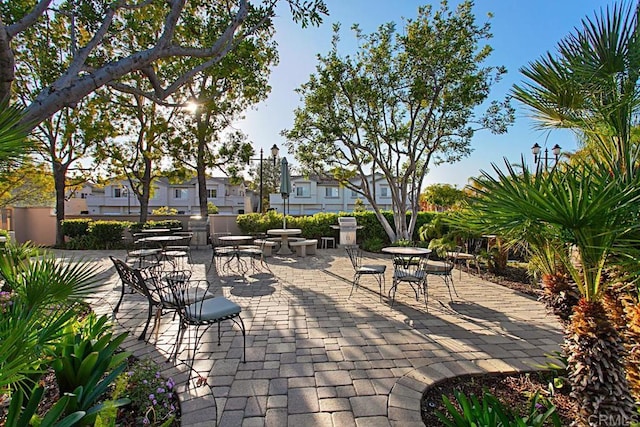 18614 Caminito Cantilena Unit 324, San Diego, CA 92128 - view of patio with a residential view and outdoor dining space