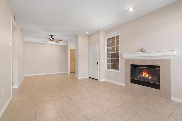 18614 Caminito Cantilena Unit 324, San Diego, CA 92128 - unfurnished living room featuring ceiling fan, tile patterned flooring, a fireplace, recessed lighting, and baseboards