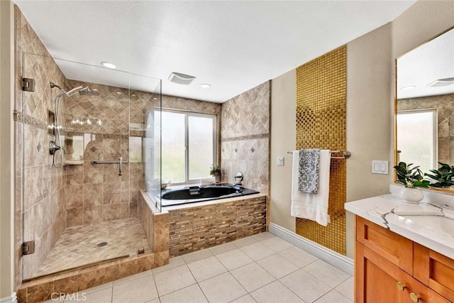 full bath with a shower stall, tile patterned flooring, and a bath