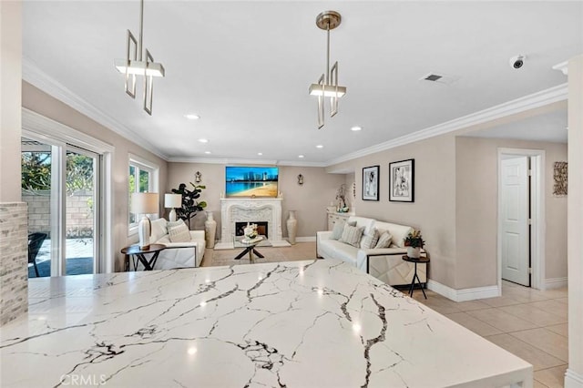 living area featuring a fireplace, baseboards, recessed lighting, and ornamental molding