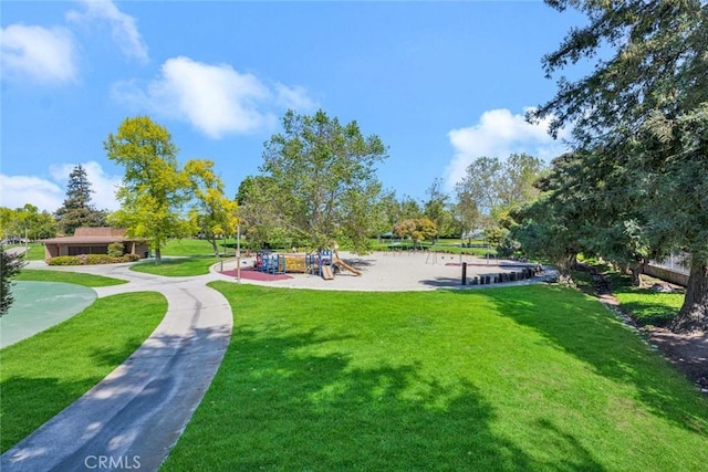 surrounding community with a lawn