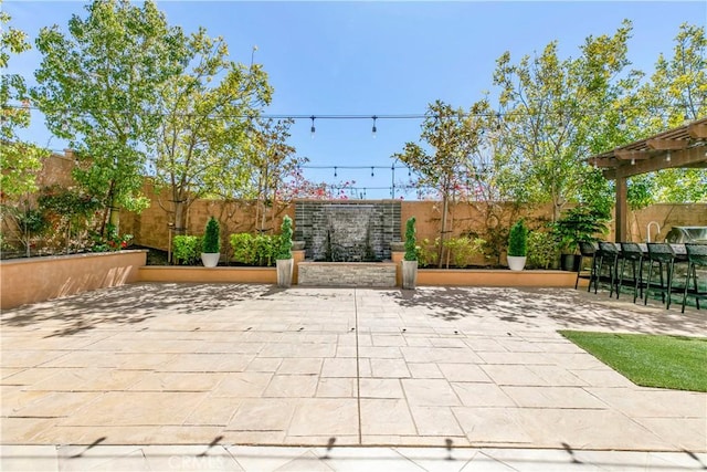 20512 W Esmeralda Ln, Porter Ranch, CA 91311 - fenced backyard featuring a patio
