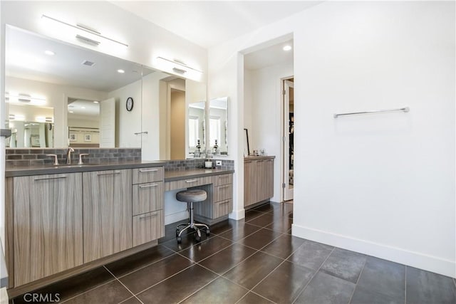 20512 W Esmeralda Ln, Porter Ranch, CA 91311 - bathroom featuring backsplash, vanity, baseboards, tile patterned floors, and recessed lighting