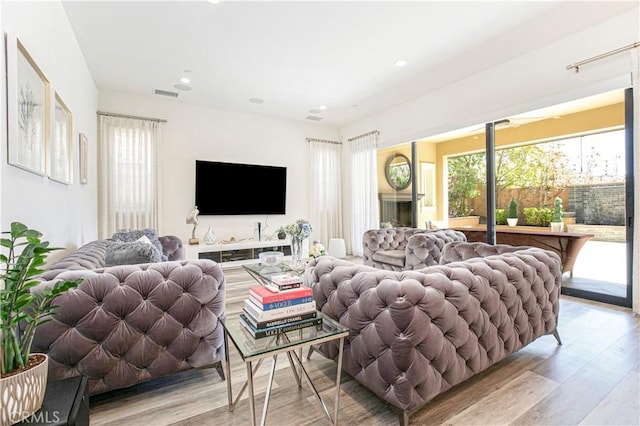 20512 W Esmeralda Ln, Porter Ranch, CA 91311 - living room featuring light wood-style floors and recessed lighting