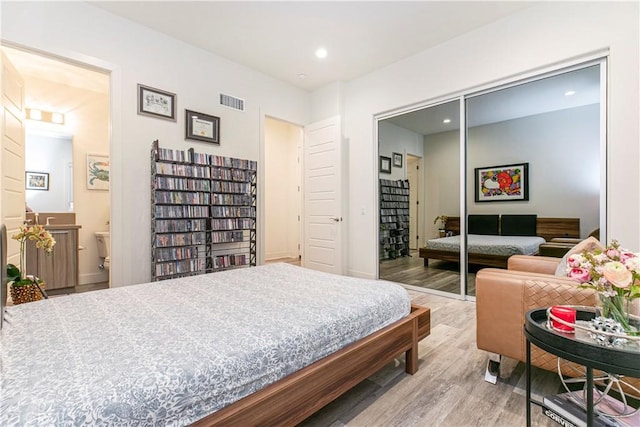 20512 W Esmeralda Ln, Porter Ranch, CA 91311 - bedroom with a closet, wood finished floors, recessed lighting, and baseboards