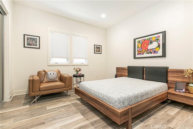 20512 W Esmeralda Ln, Porter Ranch, CA 91311 - bedroom with light wood finished floors, baseboards, and recessed lighting