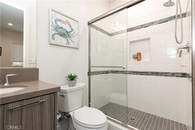 20512 W Esmeralda Ln, Porter Ranch, CA 91311 - bathroom with toilet, vanity, a shower stall, and recessed lighting