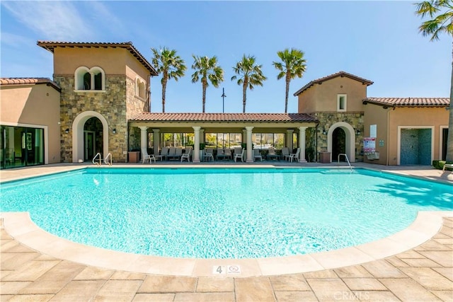 20512 W Esmeralda Ln, Porter Ranch, CA 91311 - community pool featuring a patio